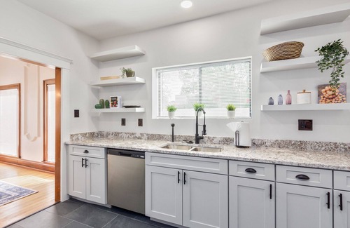 Sam Hughes House | Newly updated charming house with resort-style amenities and centrally located!