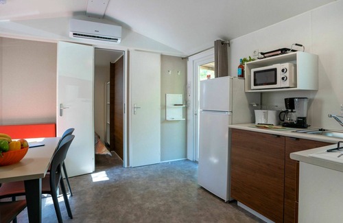 Cisano House | Nice apartment in villa for 6 people with A/C, pool, WIFI, terrace and parking
