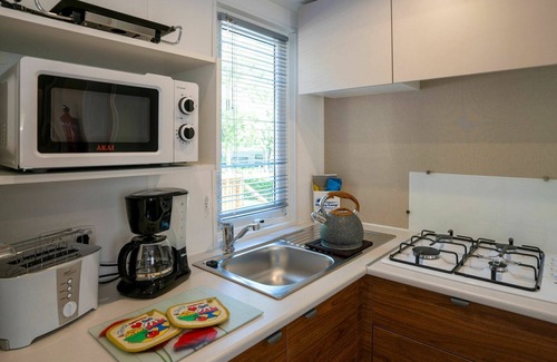Cisano House | Nice apartment in villa for 6 people with A/C, pool, WIFI, terrace and parking