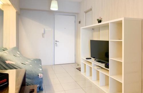 Pluit Apartment | Nice Designed 2BR with Pool View at Green Bay Pluit Apartment By Travelio