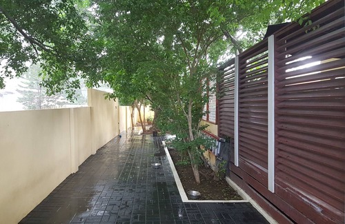 Julianadorp Apartment | Nice & private in our backyard with own entry & parking lot.