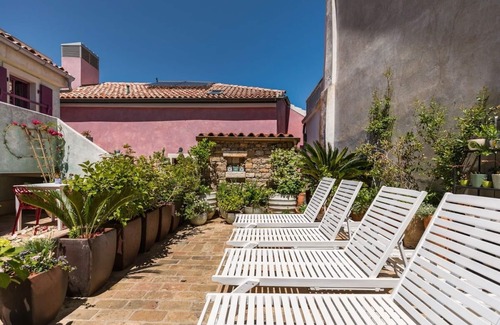 City Center Apartment | Nicely and romantic decorated Belle epoque suite with terrace, Wifi, sauna and bikes .