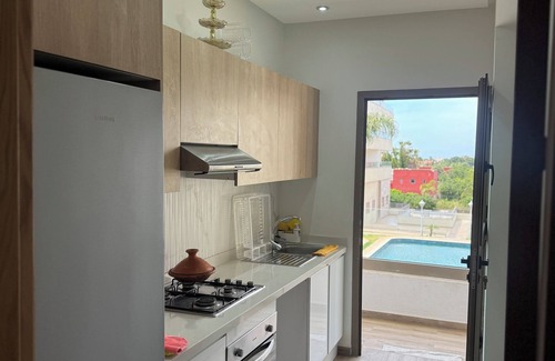 Bouznika Apartment | nn“Sunny 2BR Apartment in Bouznika – 2 min to Beach, A/C, WiFi, Family-Friendly”