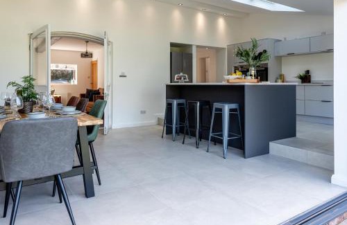 Wimbolds Trafford House | No1 Little Barrow Barns - Sleeps 10