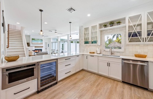 Anna Maria House | Nov/Dec Deals - Waterfront/Dock/Pool/Hot Tub/Putting/Beach by AMIHomeRental