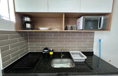 Novo Mundo Apartment | Novidade - Apartamento Grey #104