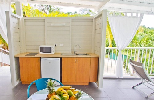 Deshaies Apartment | "O Coeur de Deshaies", Grande Anse. Sea view, swimming pool, air conditioning.