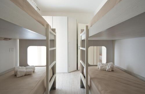 Eraclea Mare Apartment | Oasi moderna con piscina a due passi dal mare