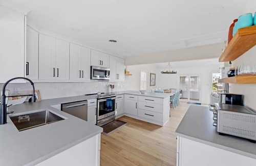South Nags Head House | Ocean and Sound Views - Sleeps 10 - Easy Beach Access - Hot Tub & Community Pool
