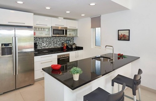 Simpson Bay Condo | Ocean Breeze at Le Papillon; Modern with steps to the Beach! Backup Generator!