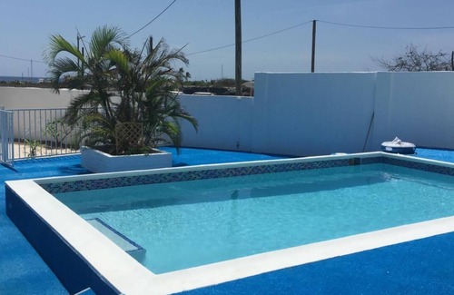 Pos Chiquito Apartment | Ocean Front Property - Villa 4 Aruba w pool view