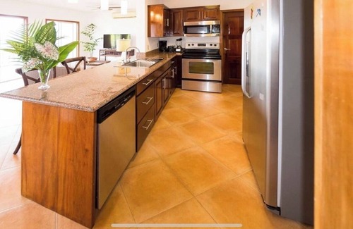 Half Moon Bay Condo | Ocean view penthouse suite overlooking Half Moon Bay in West End.