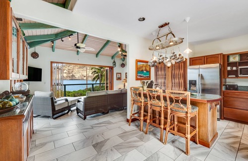 Honaunau-Napoopoo House | Oceanfront sanctuary with light-filled interior, lanai, W/D, & full kitchen