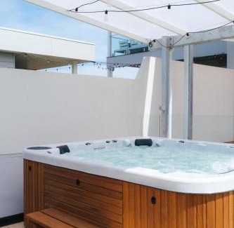 Surf Beach House | Oceanview Escape - Luxe Coastal Retreat with Hot Tub