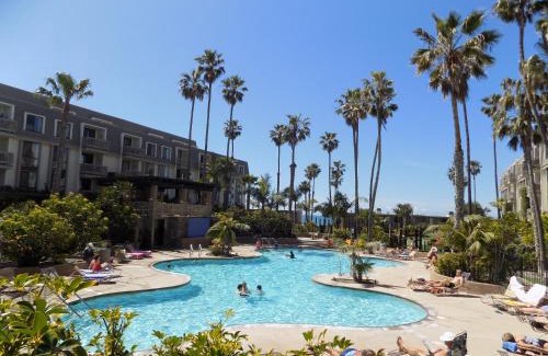 Townsite Apartment | Oceanview Retreat - Steps to the Beach, Heated Pool, walk everywhere