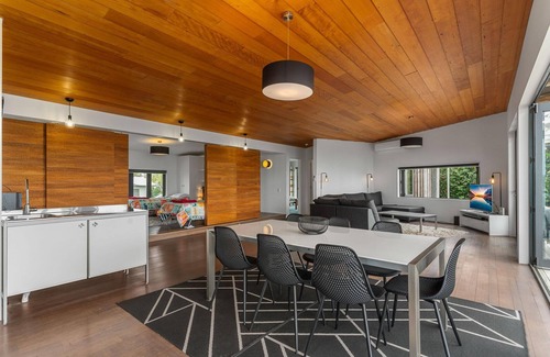 Langs Beach House | Oceanview Sanctuary - Modern, sunny holiday home with extensive decks and stunning views over Bream Bay