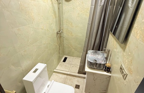 Kutaisi Apartment | Old Balcony - Holiday Home - Urban Elegance in the Heart of the City Kutaisi.