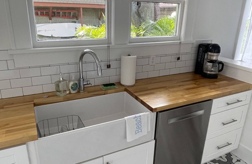 St. Petersburg - Clearwater House | Old NE bungalow, lower level near Black Crow. Walk or Bike with ease to downtown