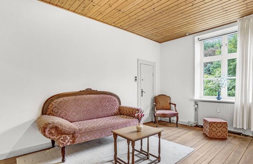 Tonder House | Older property in a rural setting with views of the water tower in Tønder.