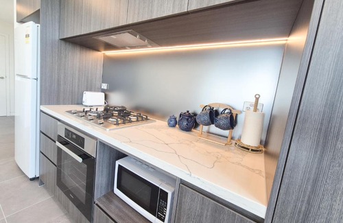 Lidcombe Apartment | Olympic Park Escape 2BR w Gym, Pool & Free Parking