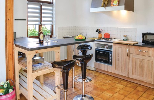 Arques House | On a riverbank just a few minutes from the city center, this charming vacation home opens its doors