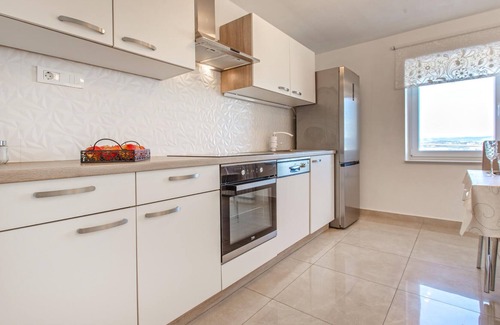 Koper House | On the Adriatic coast of Slovenia, this comfortable vacation home with swimming pool and sea view we