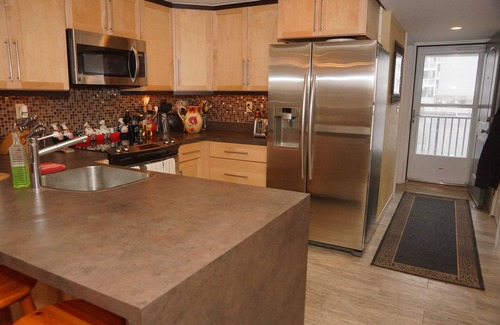 Midtown Ocean City Condo | On the beach, in the middle of the fun. Over 120 Five Star Reviews!