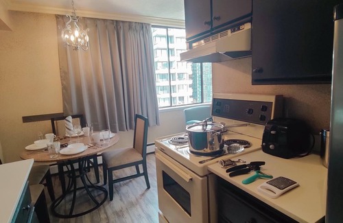 West End Hotel | One Bedroom Apartment with Robson View