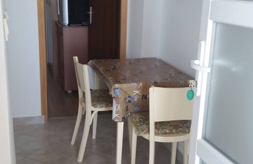 Kolan Apartment | One bedroom apartment with terrace and sea view Kolan, Pag (A-16482-a)