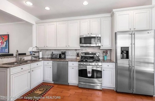 Fort Monmouth House | One block from beach. Ocean front view with hot tub.