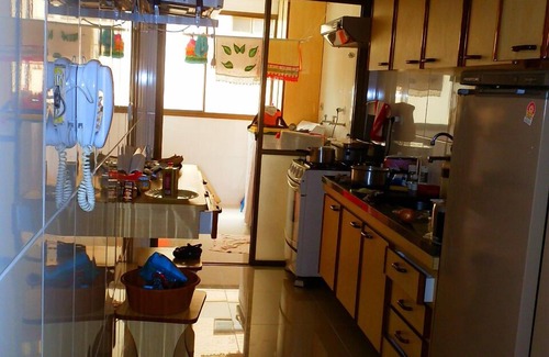 Jardim Vitoria Apartment | One block from the cove beach in Guarujá - 2 suites