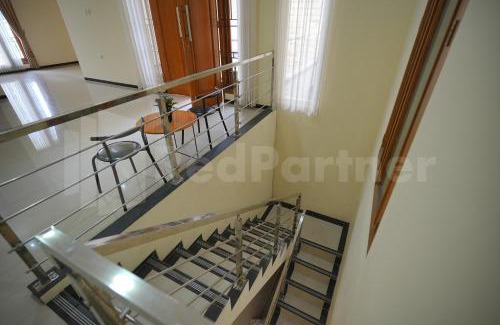 Dinoyo House | One & Quin Guest House Syariah Mitra RedDoorz