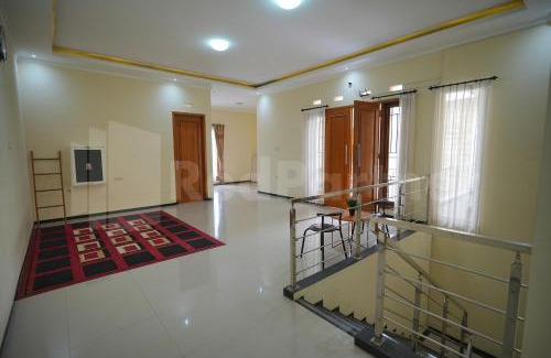 Dinoyo House | One & Quin Guest House Syariah Mitra RedDoorz