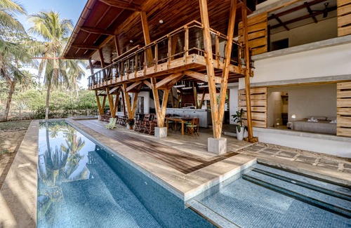 Javilla House | Open, dog-friendly, beachfront house with a private pool, pool spa, & WiFi