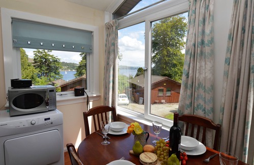 Kilmun Ski Chalet | Open plan lodge with stunning views, near Dunoon, sleeps 4, pet friendly