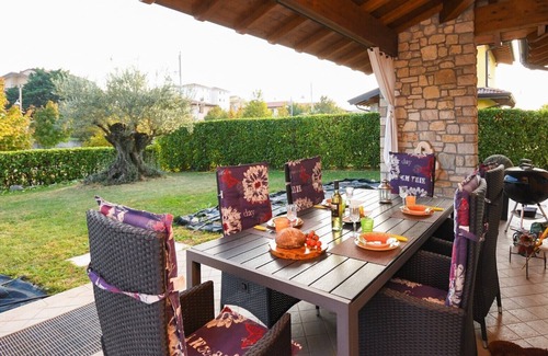 Moniga del Garda Ski Chalet | Orange: private house with garden in the centre of Moniga del Garda
