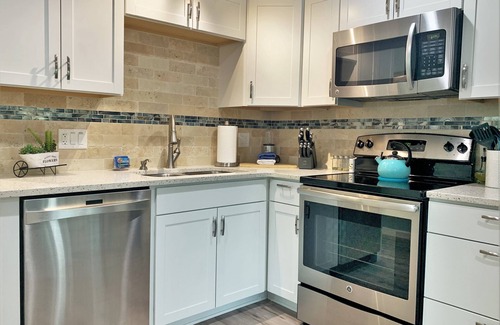 Vacation Village House | Orange You Worth It? Luxe escape near Disney, Fast Wi-Fi, Resort amenities.