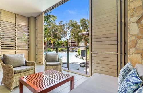 Palm Cove Apartment | Orchid at Temple Resort - Waterfront Swim-out Oasis