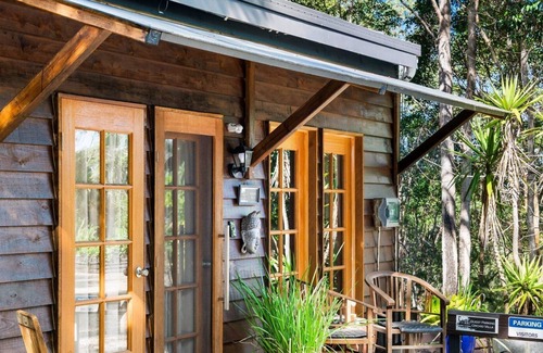 Tinbeerwah Resort | Orchid villa is decorated in Asian inspired décor with timber throughout