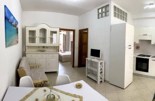 Nulvi Apartment | Osiris house with private garden and barbecue
