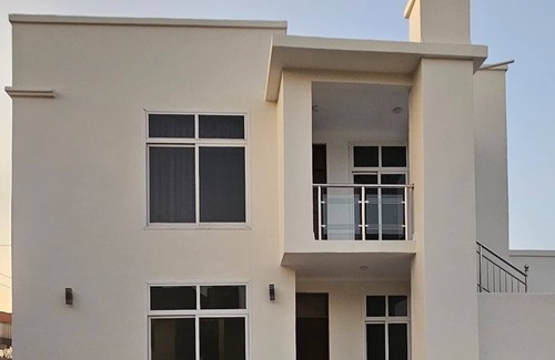 Kunduchi Apartment | Our facilities include air conditioning, hot water, fans, and WIF