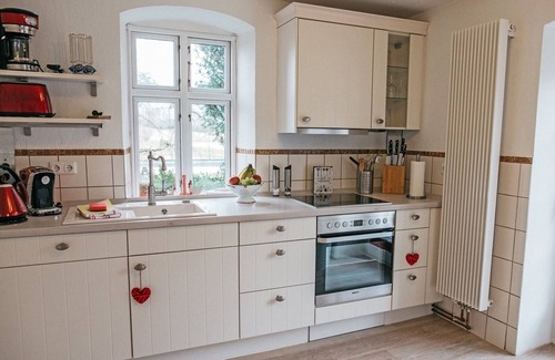 Kappeln Apartment | Our modern "Kleine Wassermühle" vacation apartment with sauna and wood-burning stove is perfect for those seeking relaxation and nature lovers