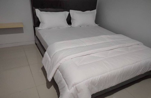 Waru Hotel | OYO 90844 Guesthouse Parung Asri Syariah