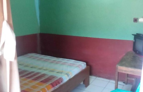 Kretek Hotel | OYO 93174 Pondok Yudhistira