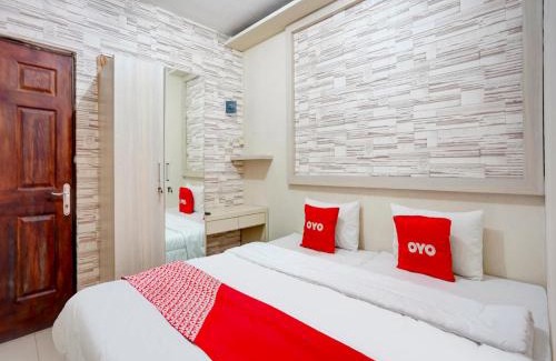 Surabaya Hotel | OYO Life 90606 Glass House Citraland Syariah