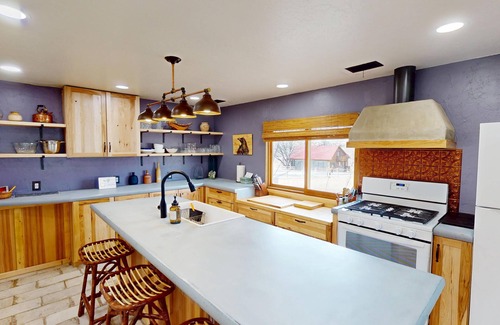 Spanish Valley Cabin | Pack Creek ~ Meadow House: Boho mountain oasis with fireplace, patio views, and stargazing bed