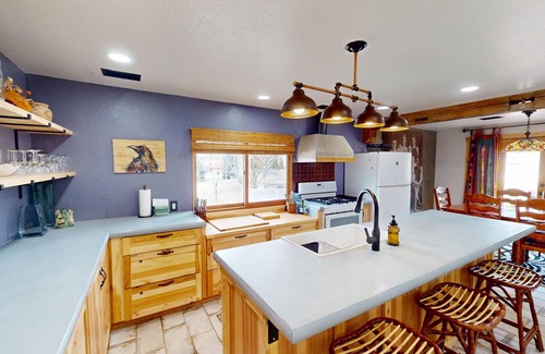 Spanish Valley Cabin | Pack Creek ~ Meadow House: Boho mountain oasis with fireplace, patio views, and stargazing bed