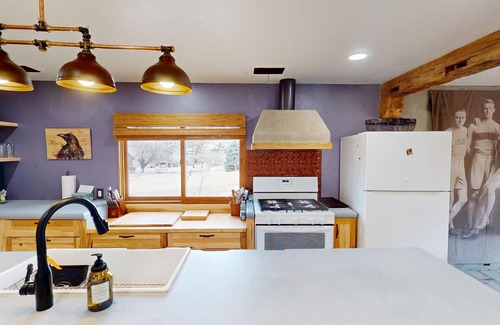 Spanish Valley Cabin | Pack Creek ~ Meadow House: Boho mountain oasis with fireplace, patio views, and stargazing bed
