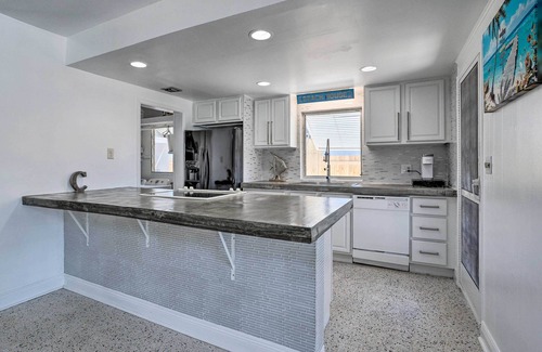 Palm City House | Palm City Canalfront Home w/Boat Dock & Fire Pit!
