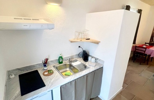 Panza Apartment | "Palm Cottage" with garden, swimming pool and spa hot tub